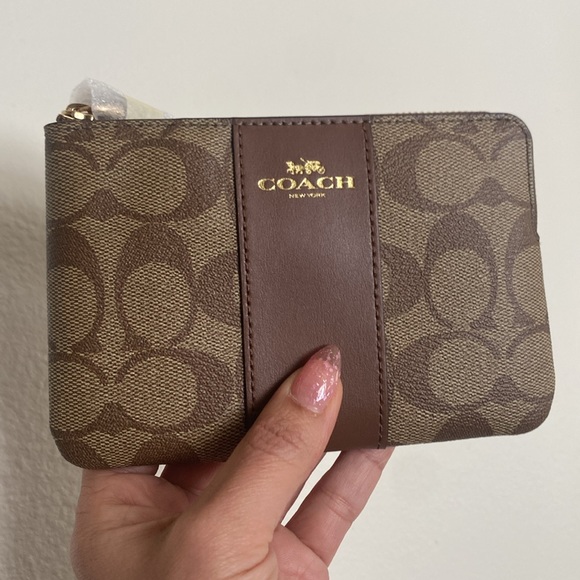 Coach Handbags - Coach wristlets Corner Zip Wristlet In Signature Canvas